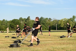 Army Reserve Soldiers pull a 90-pound sled during the Sprint-Drag-Carry event, one of six test events for the Army Combat Fitness Test, at Operation Ready Warrior exercise, at Fort McCoy, Wisconsin, August 23, 2020.