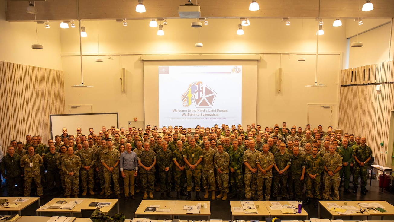 Soldiers from the U.S., Norway, Sweden, Finland and Denmark, pose for a group photo during the Nordic Warfighter Symposium, hosted by the Norwegian Army, and facilitated by V Corps, the U.S. Army’s only forward deployed headquarters. Finland and Sweden’s recent inclusion in NATO marks the first time in 500 hundred years that Nordic nations share a common defense. The Symposium brings together senior leadership to foster a continuous dialogue between the U.S. The goal of the symposium is to improve interoperability and effectiveness of NATO partners during large-scale combat operations. The event took place at the Norwegian Military Academy in Oslo, Norway 20-22 Aug. 2024. (U.S. Army photo by Pfc. Richard Morgan)