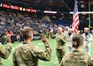 Army Reserve Medical Command Deputy Commanding General Brig. Gen. Thad J. Collard administered the Affirmation of Enlistment Oath to six Army Reserve Soldiers during halftime at the July 5, 2024, Arena Football League playoff game between the Orlando Predators and the Nashville Kats held at Orlando, Florida's Kia Center. The Predators invited the Soldiers and their guests as part of their Military Appreciation Night. (U.S. Army photo by Sgt. 1st Class Neil W. McCabe)