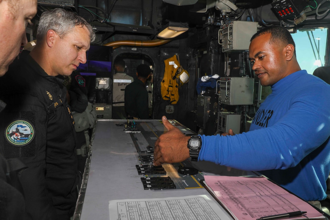 Cmdre. Matthew Coates, commander of Standing North Atlantic Treaty Organization Maritime Group 2, visits USS Wasp (LHD 1).