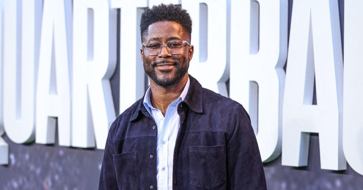 Nate Burleson posing for a press photo for Netflix