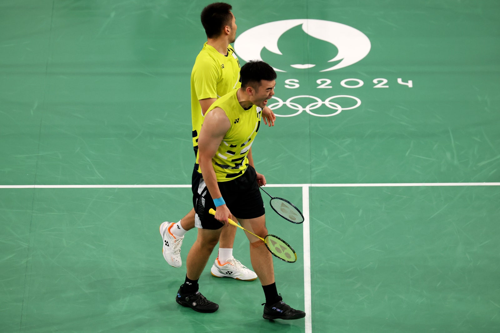 PARIS FRANCE  AUGUST 04 ChiLin Wang and Yang Lee of Team Chinese Taipei celebrate during the Badminton Men's Doubles...