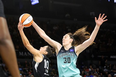 New York Liberty forward Breanna Stewart (30) blocks a layup by Las Vegas Aces guard Kelsey Plum (10) during the second half of an WNBA basketball game at Michelob Ultra Arena in Mandalay Bay Saturday, Aug. 17, 2024.