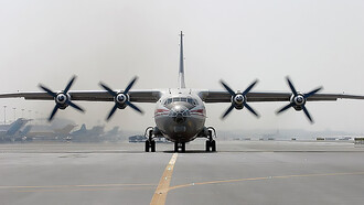 Antonov An-12 aircraft in action, explore images taken at Dubai International Airport (DXB / OMDB), United Arab Emirates