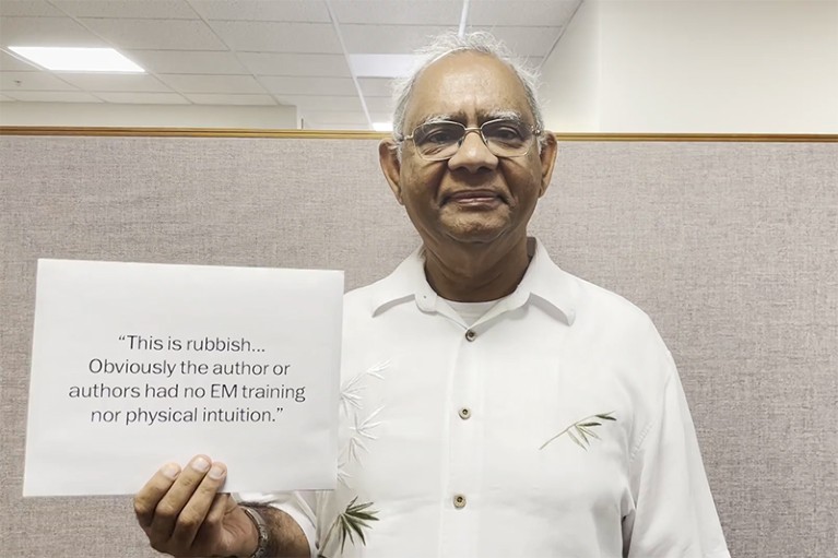 A still from IOP Publishing’s video showing Akhlesh Lakhtakia holding a piece of paper displaying a rude peer review comment