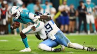 MIAMI GARDENS, FL – SEPTEMBER 30: Sebastian Joseph-Day #69 of the Tennessee Titans sacks Tyler Huntley #18 of the Miami Dolphins during the third quarter, Monday at Hard Rock Stadium on September 30, 2024 in Miami Gardens, Florida. (Photo by Kevin Sabitus/Getty Images)