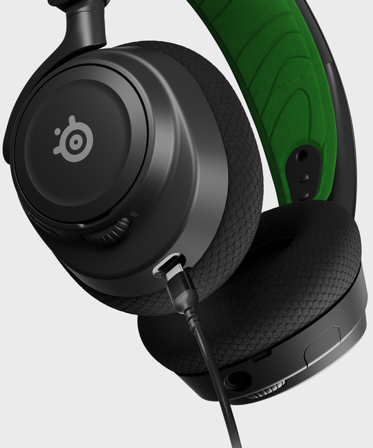 Arctis Nova 7 headphones with intention to show USB-C connection.