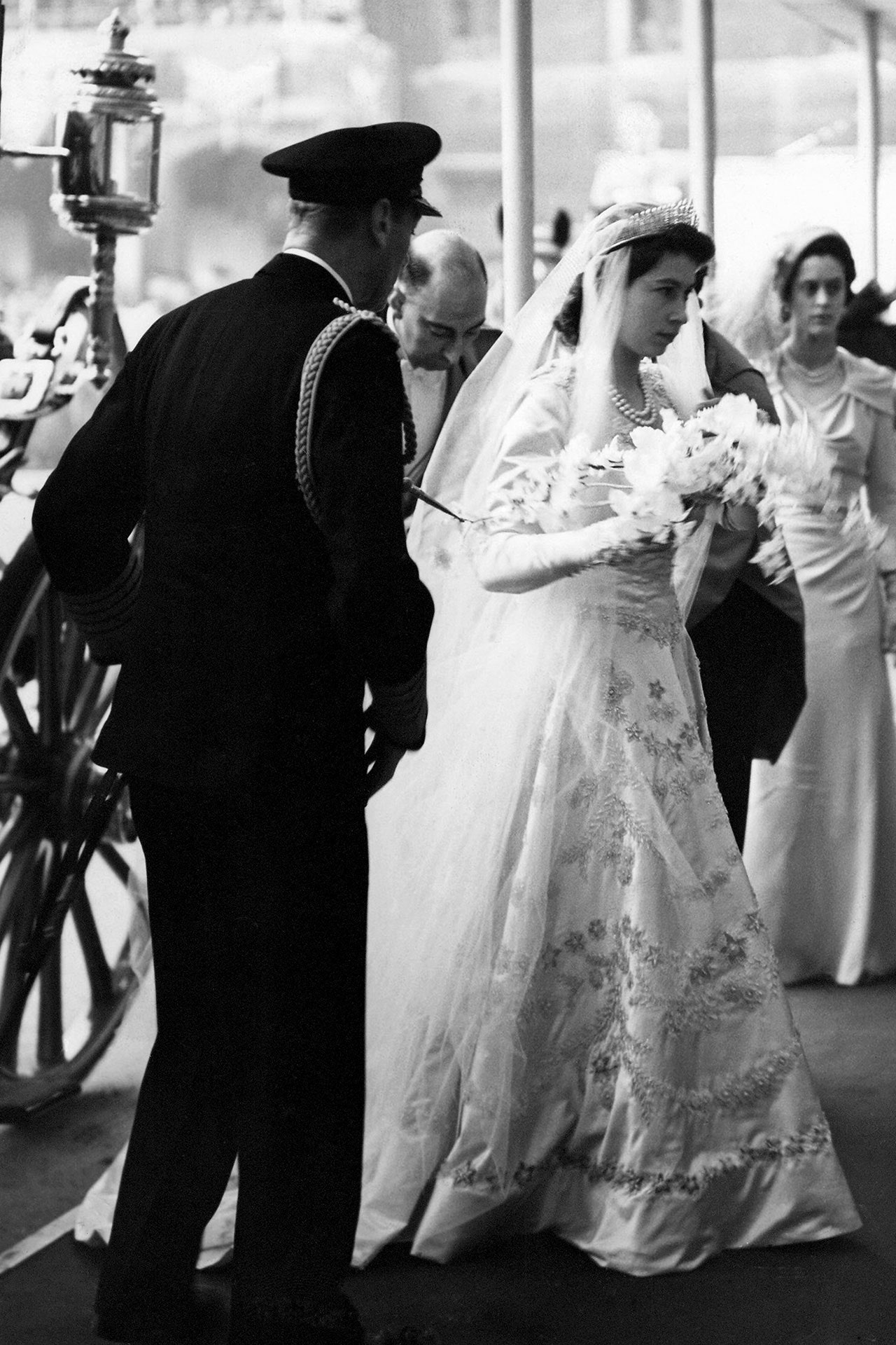 Princess Elizabeth arrives at Westminster Abbey with her father King George VI