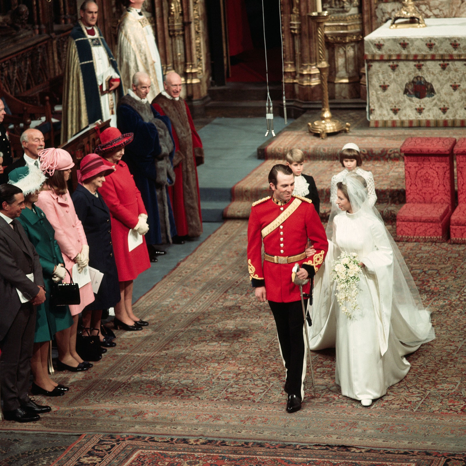 Princes Anne and Captain Mark Phillips walk down the aisle together after being married at Westminster Cathedral 1973