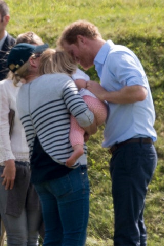 Prince Harry coos over Mia at the Maserati Royal Charity Polo Trophy at Beaufort Polo Club June 2016