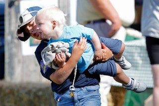 Mia Tindall plays with her younger brother Lucas at Gatcombe Park August 2022