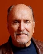 Robert Duvall as Adam Ballard and Louis Mace