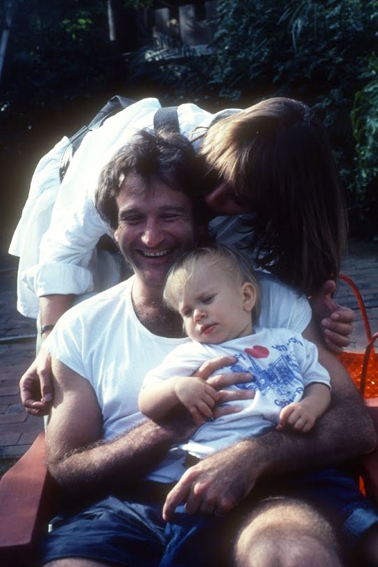 Image may contain Face Human Person Baby Female Smile Robin Williams and Newborn