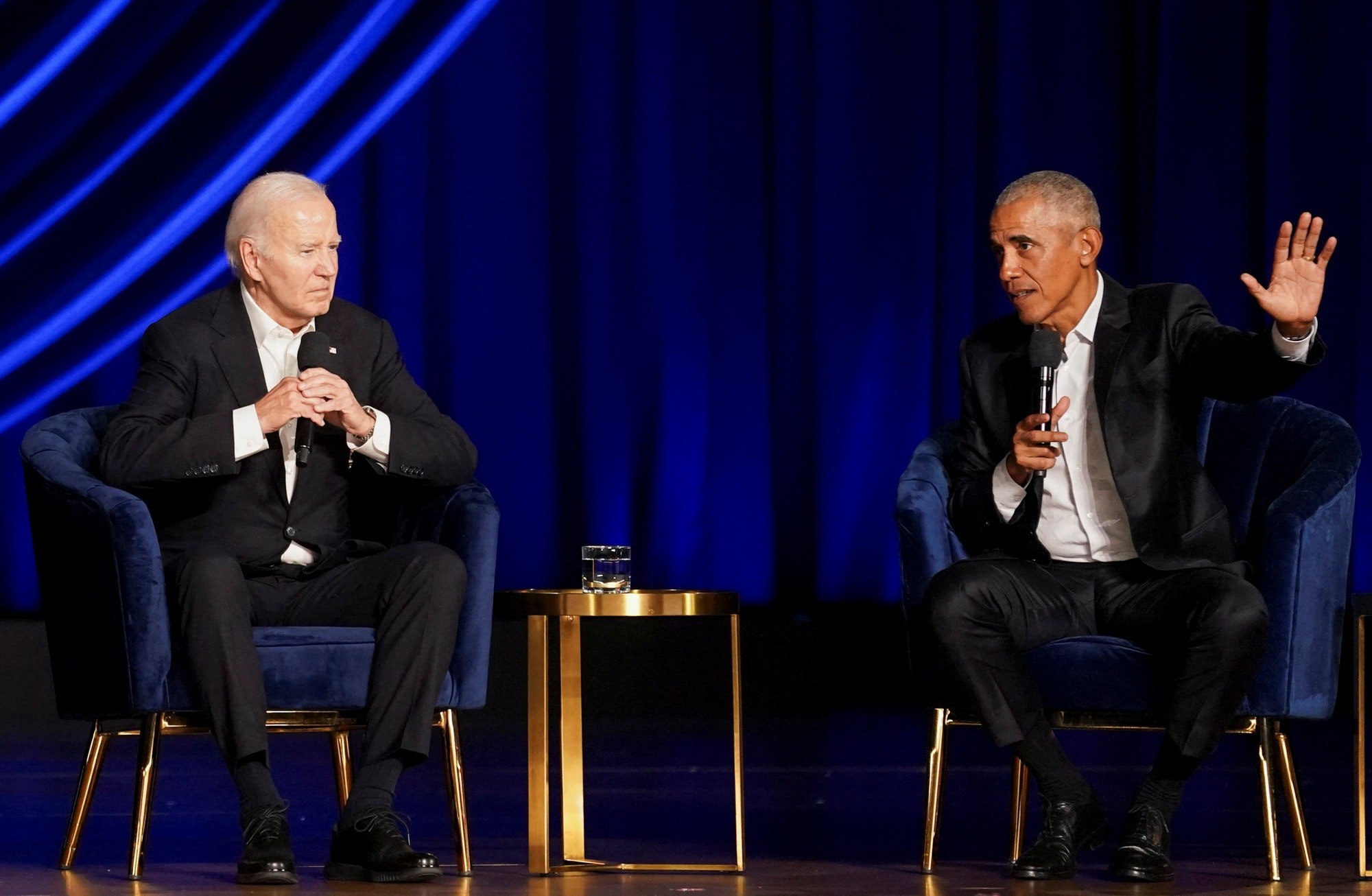 Joe Biden takes part in a conversation with Barack Obama during a campaign fundraiser at the Peacock Theater in Los...