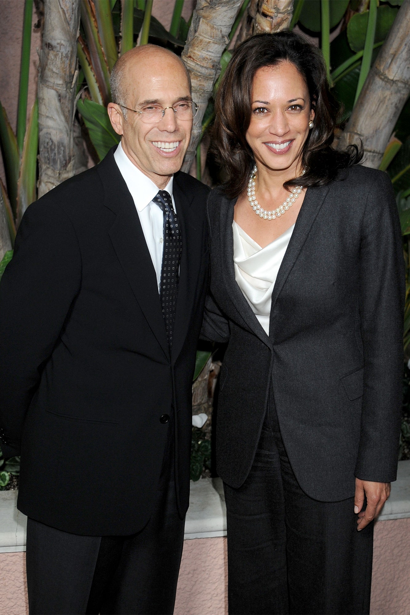 Image may contain Jeffrey Katzenberg Kamala Harris Blazer Clothing Coat Jacket Formal Wear Suit and Accessories