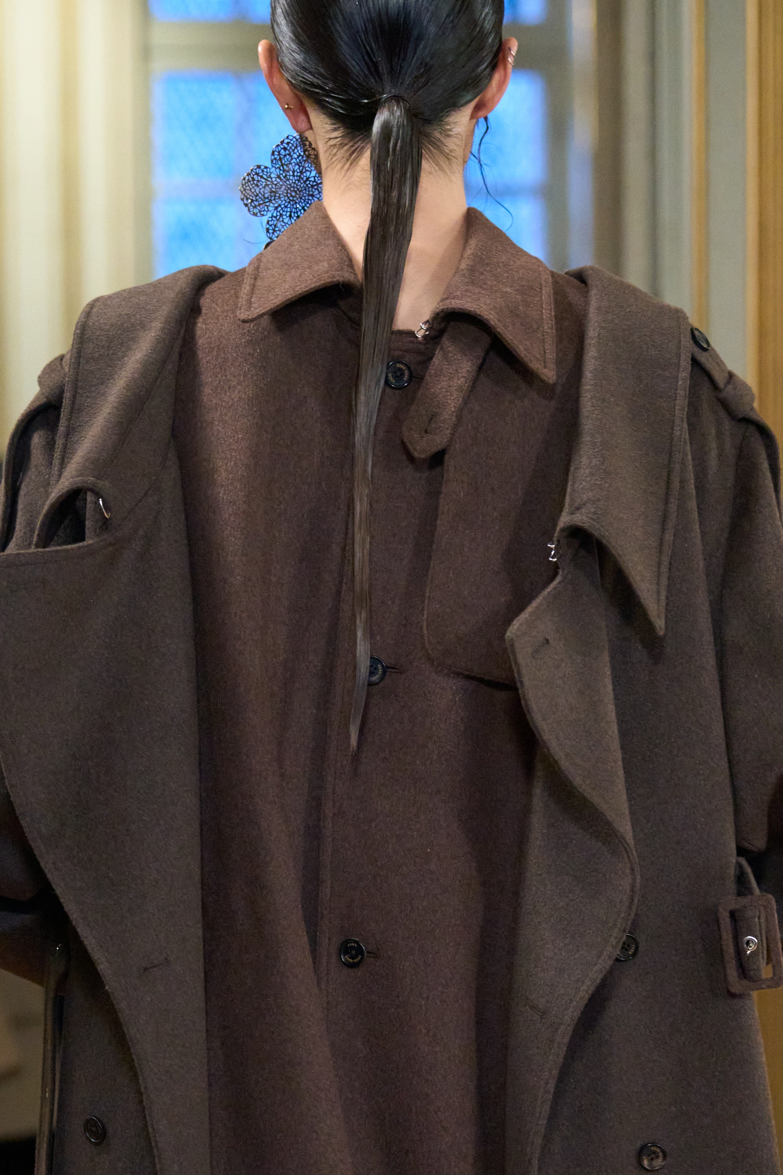 Image may contain Clothing Coat Overcoat and Trench Coat