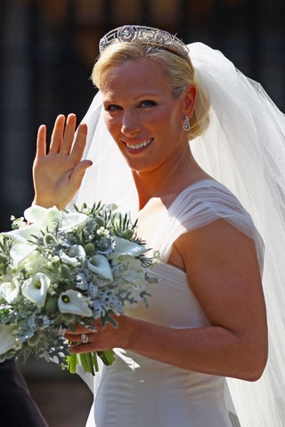 Image may contain Zara Tindall Human Person Plant Clothing Apparel Flower Flower Bouquet and Flower Arrangement