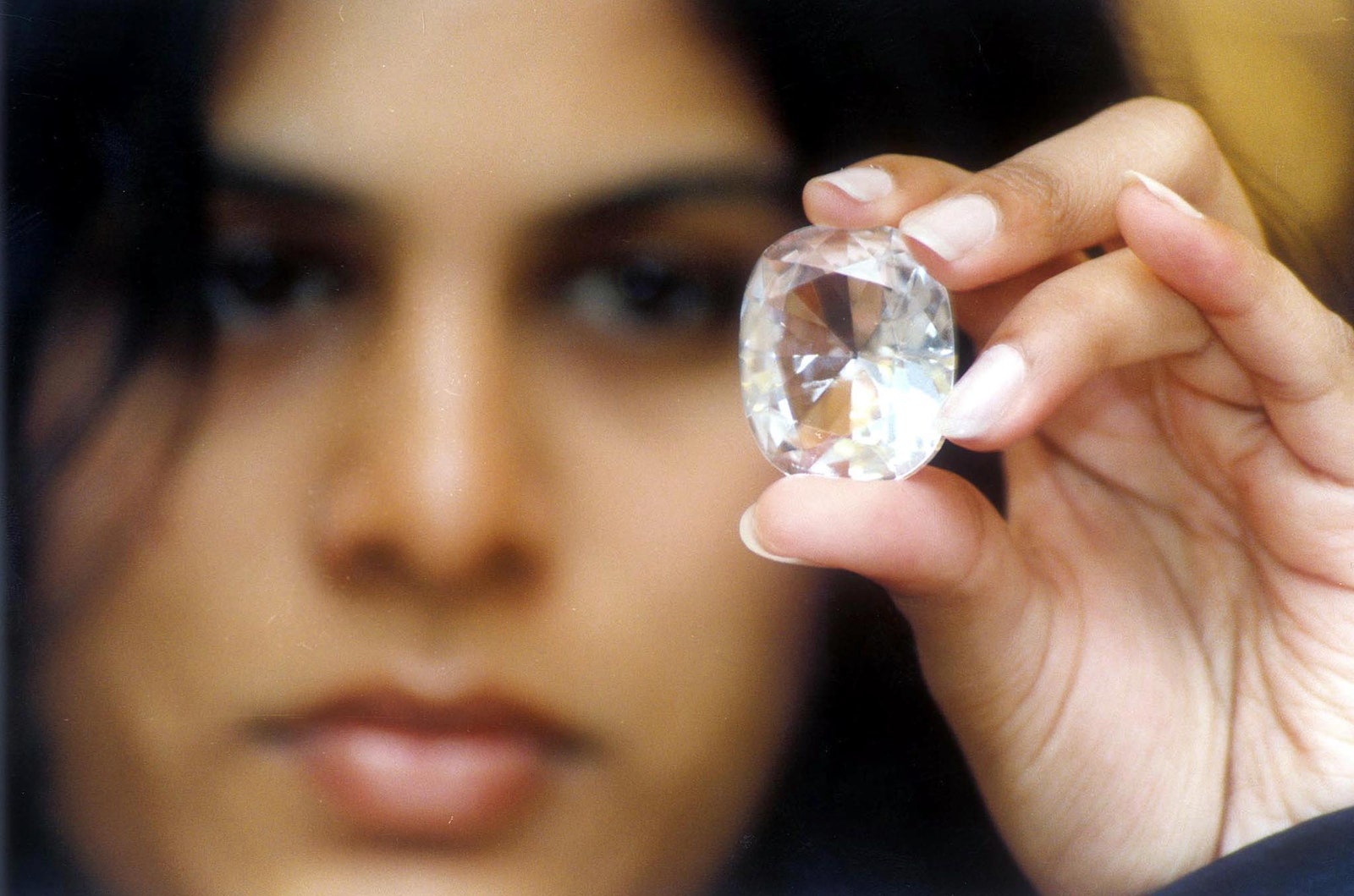 BANGALORE INDIA  Executive Director of Jewels de Paragon  Pavana Kishore shows the KohINoor diamond on display with...