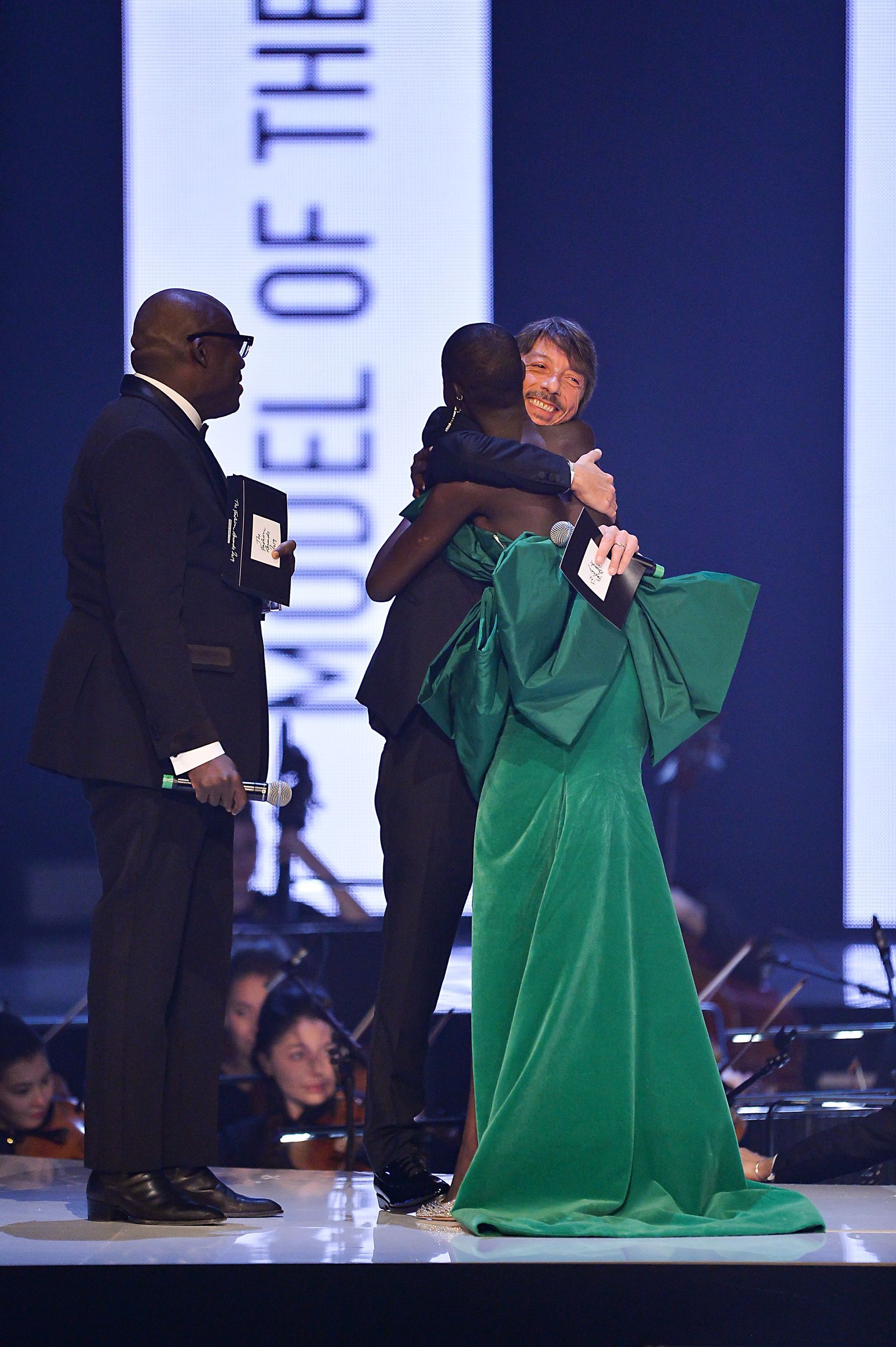 Pierpaolo Piccioli with Adut Akech awarded Model of the Year at the 2019 Fashion Awards