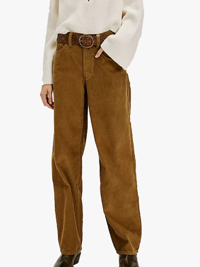 Image may contain Clothing Pants Suede and Jeans