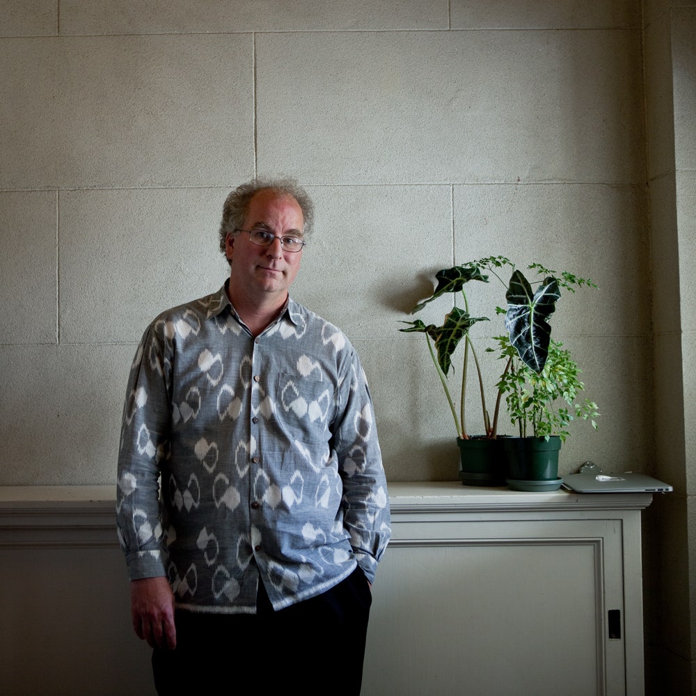 Image may contain Brewster Kahle Clothing Sleeve Apparel Shirt Long Sleeve Home Decor Human Person and Plant