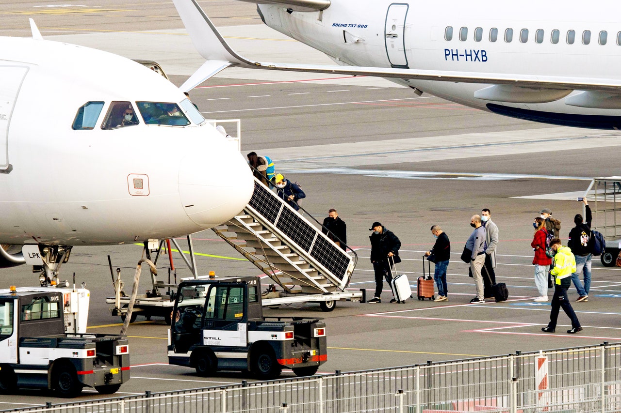 The Art and Science of Boarding an Airplane in a Pandemic