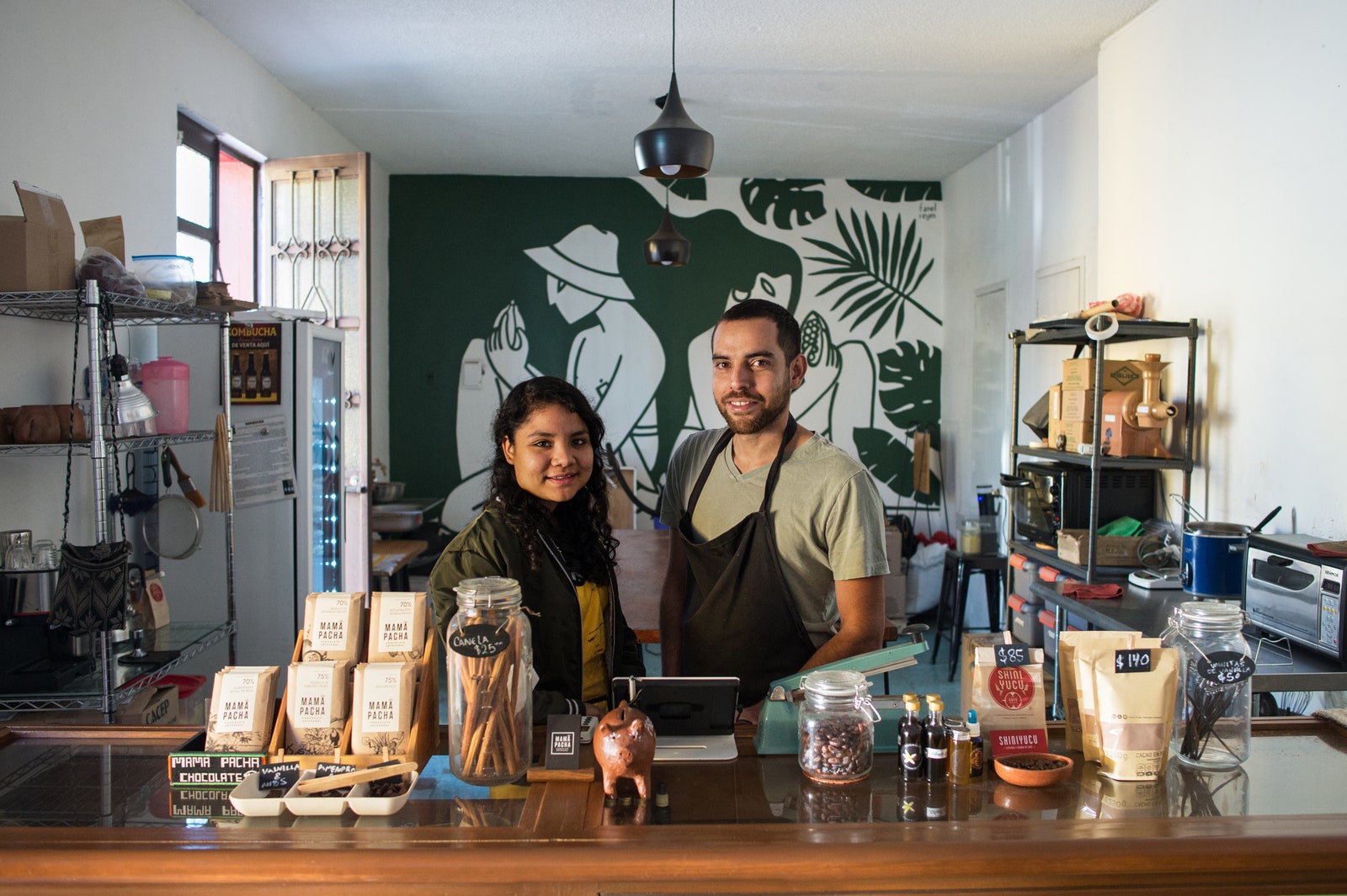 Mama Pacha founders standing in their store