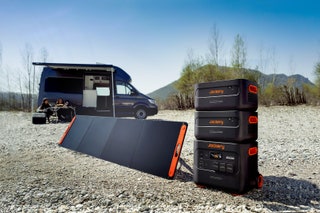 Jackery Explorer 2000 Plus charging station outside next to a van