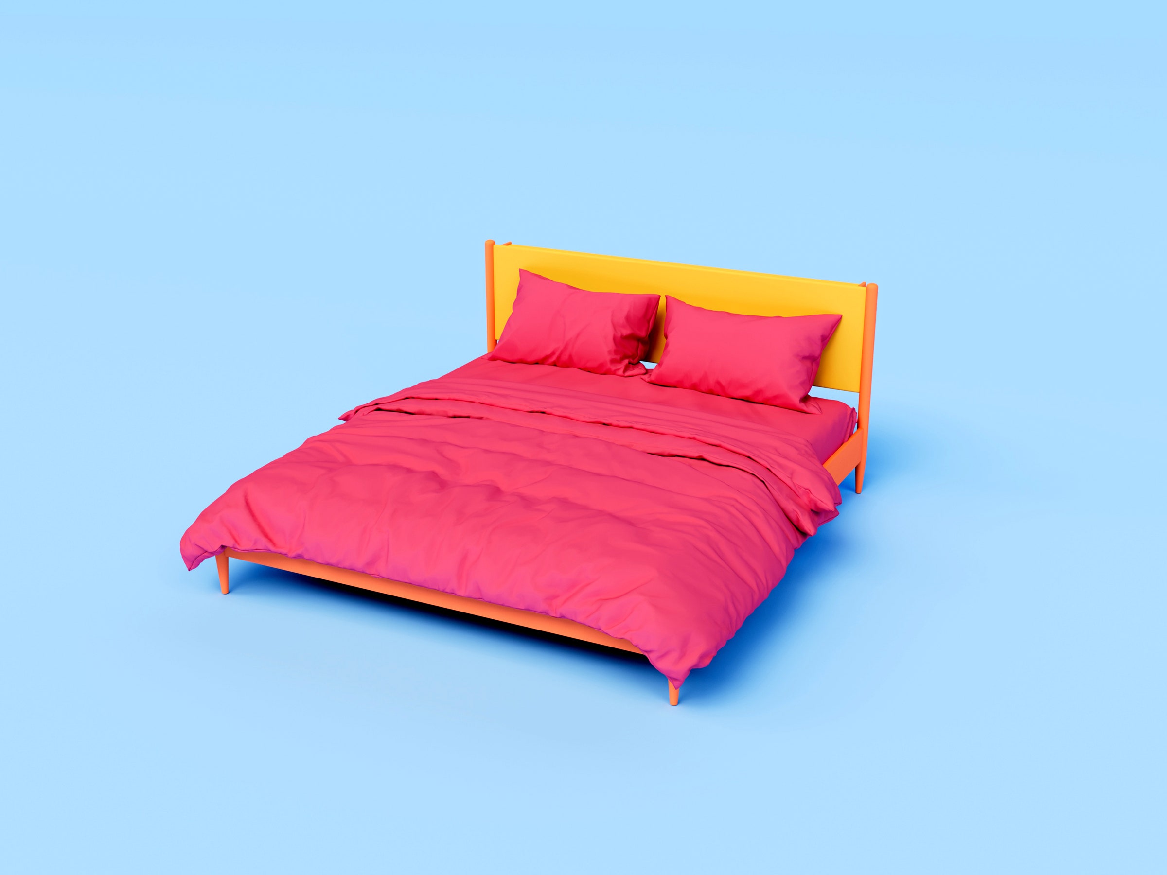 Bed with red sheets on a blue backdrop