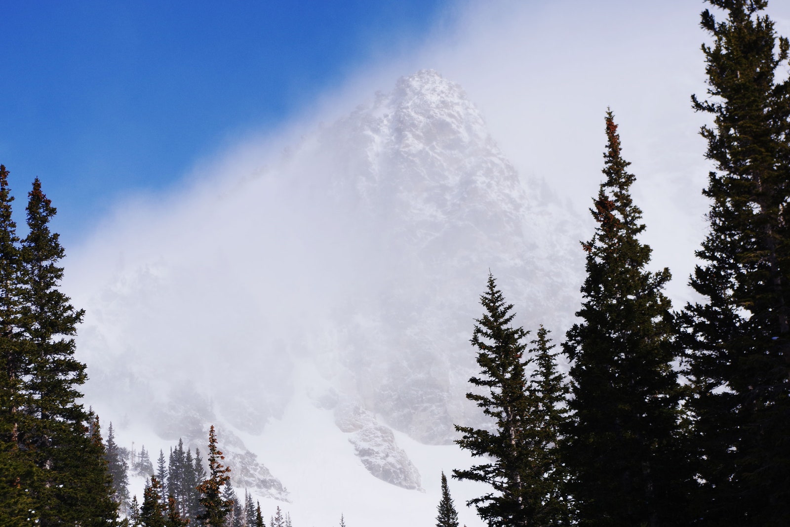 snow blowing on mountain