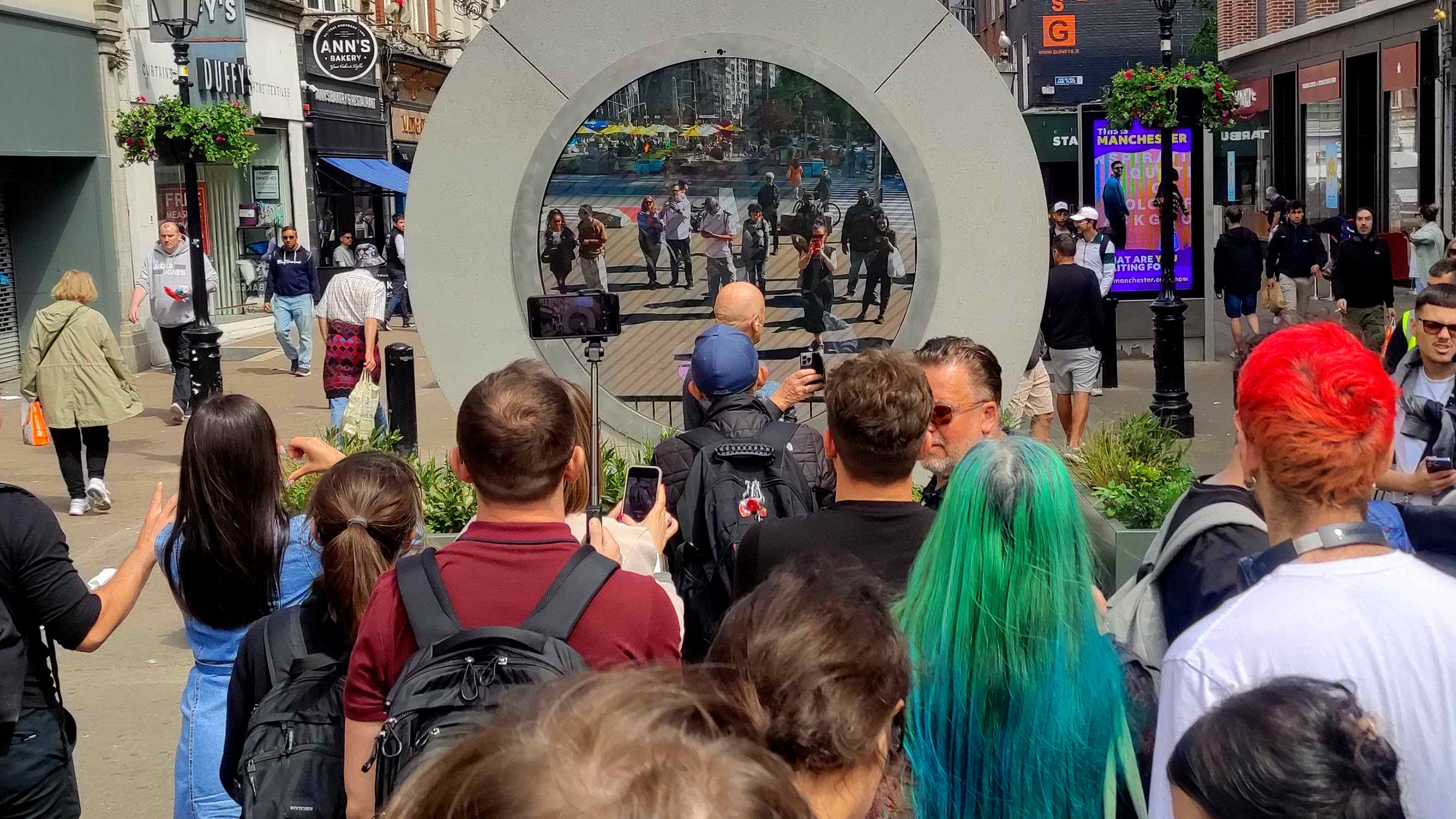 Crowd of people looking at the Dublin portal