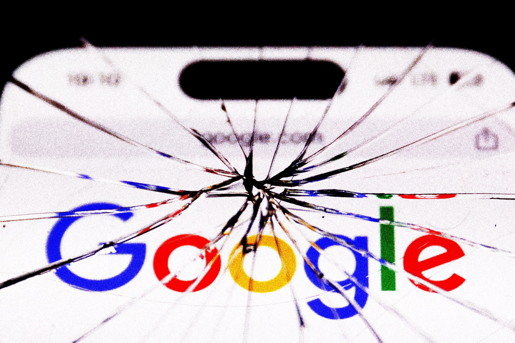 Google search engine seen through cracked phone screen