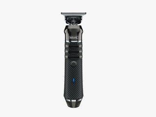 Front view of sleek black beard trimmer with textured grip and small power light