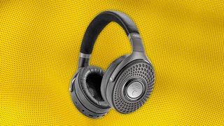 Black headphones. Background yellow dotted texture.