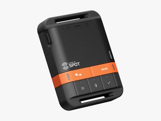 Small thick black device with orange stripe and a few simple buttons