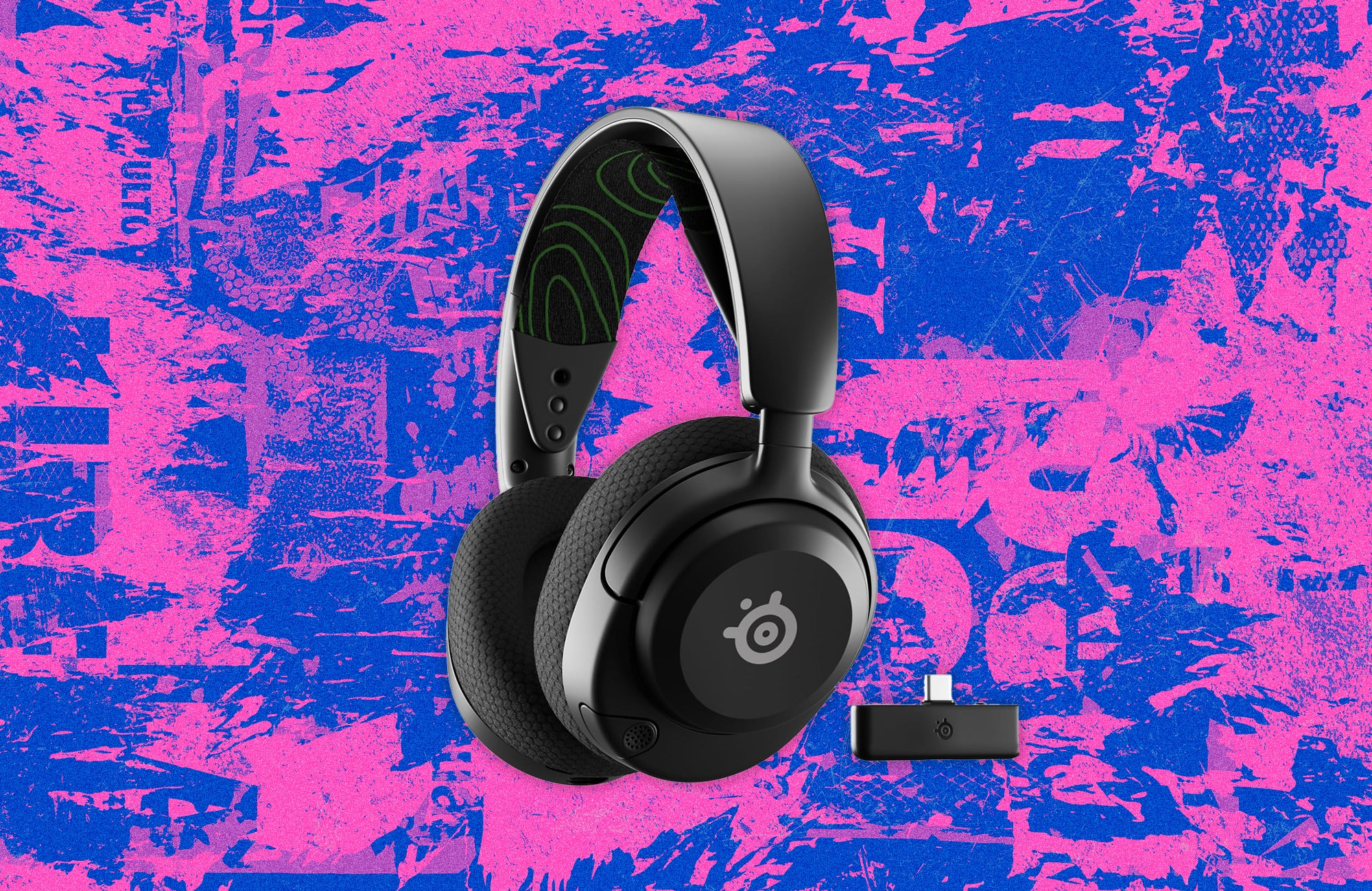 Black overthehead headphones with padded band and cushioned ear cups. Background pink and blue grunge texture.