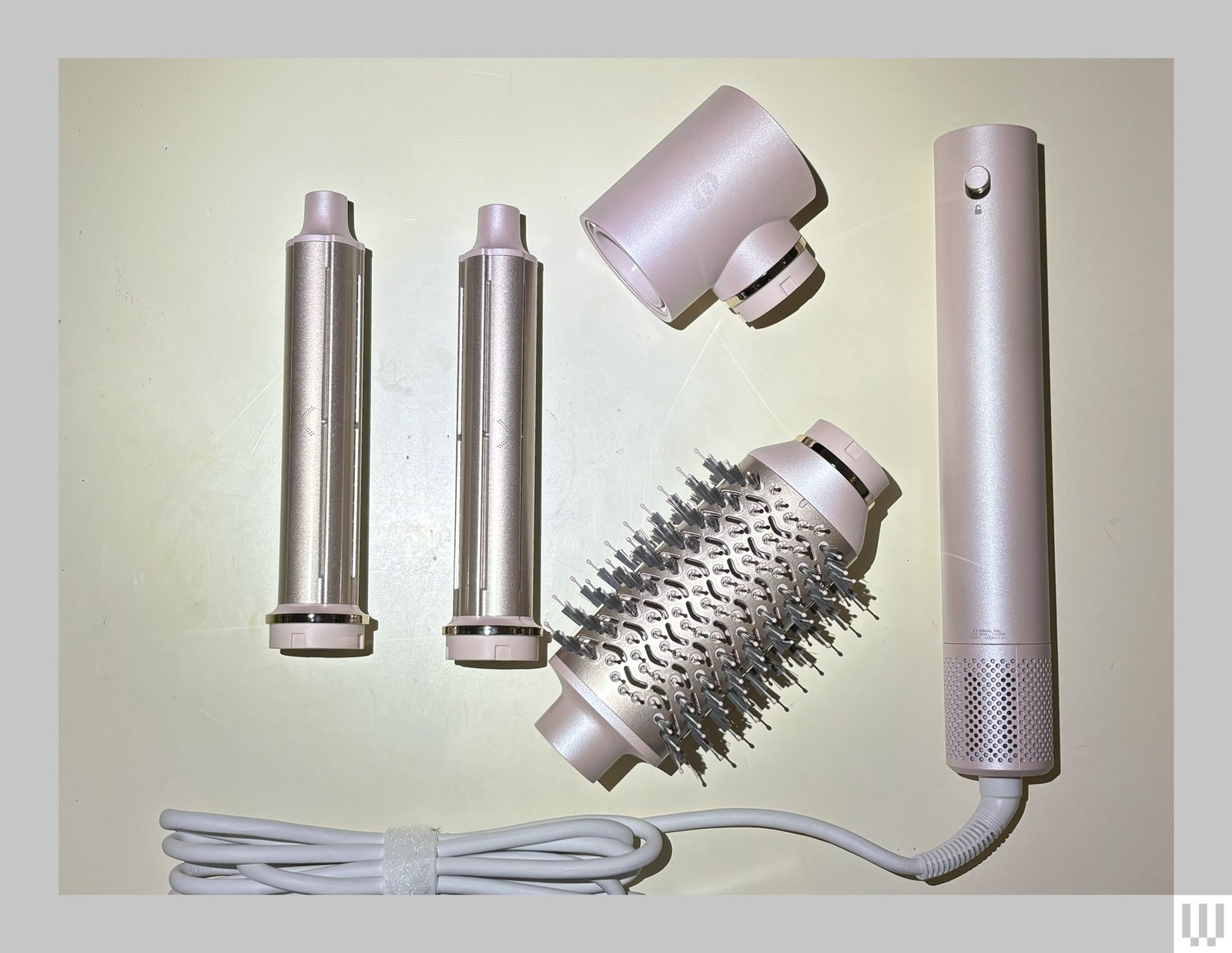 Attachments for a hair dryer including 2 curling rods a brush and handle with cord