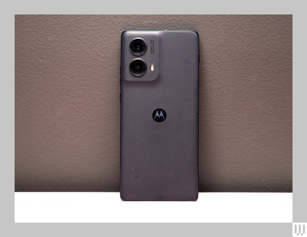 Back view of the Motorola Edge, a slim black mobile phone, showing the cameras.