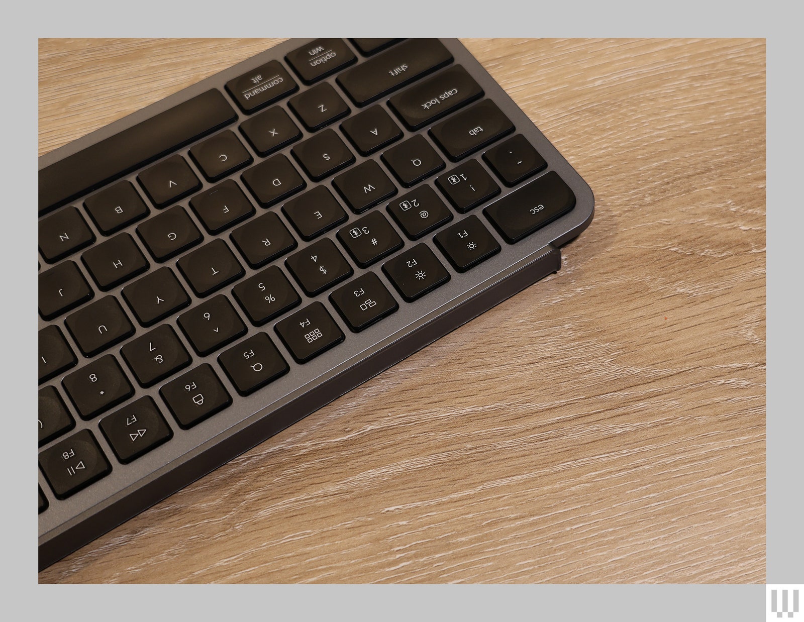 Closeup of the top edge of a black computer keyboard