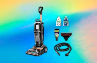 Upright vacuum and accessories included brush hose and cleaning solution