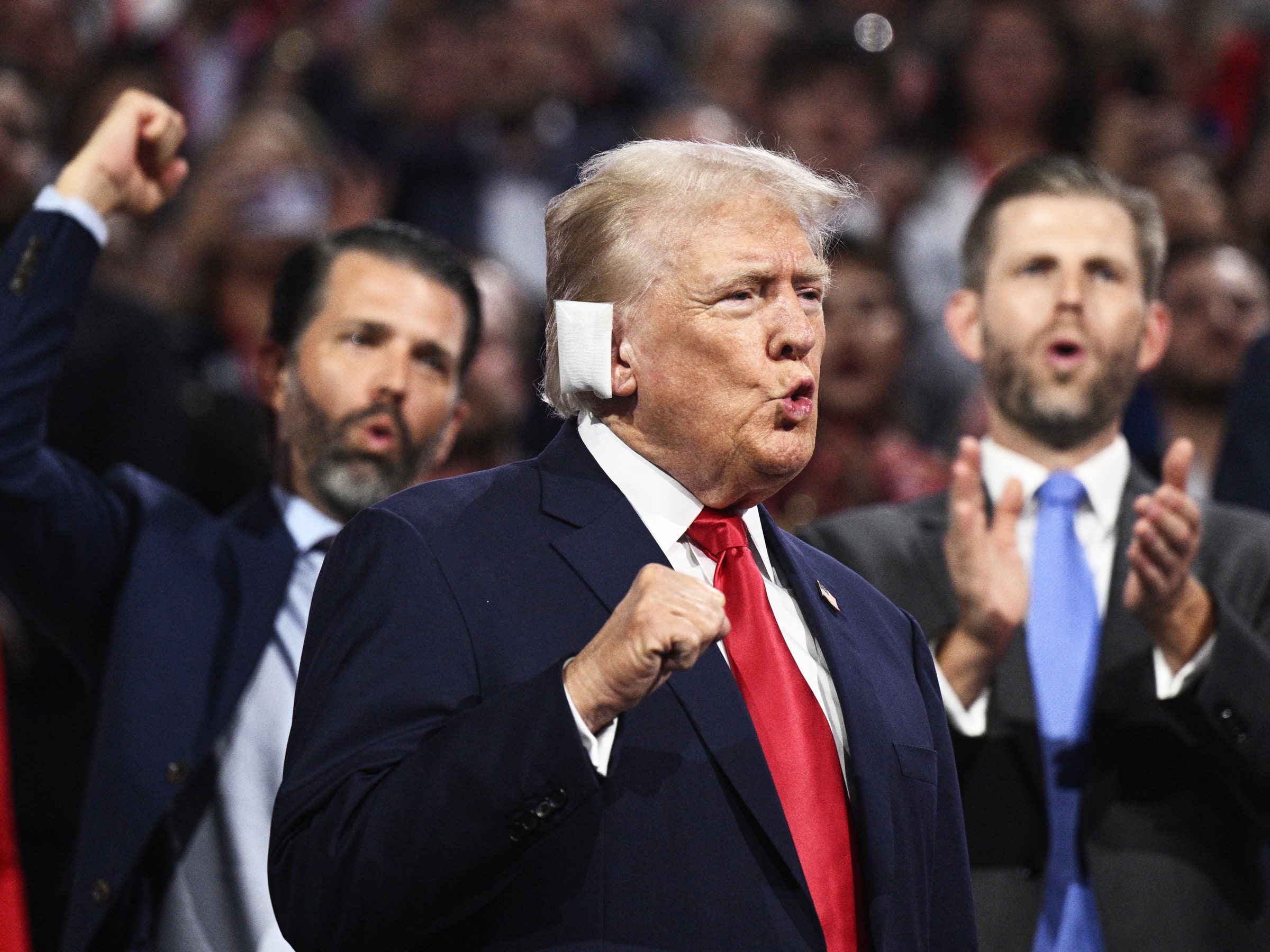 A photo of US former President and 2024 Republican presidential candidate Donald Trump gestures during the first day of...