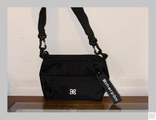 Small black bag with long strap