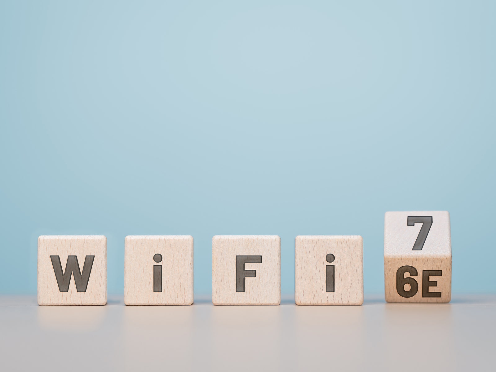 Toy blocks that spell out WIFI 7