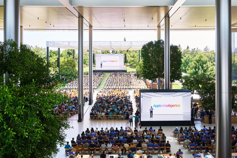 A still of many developers in attendance at Apple Park, seated to watch Apple's keynote for WWDC24.