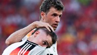 Enttäuscht und erschöpft: Deutschlands Florian Wirtz (vorne) und Thomas Müller