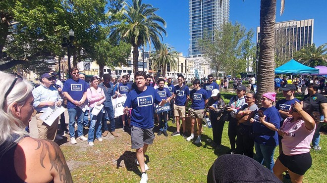 Aaron Bos-Lun speaks at rally