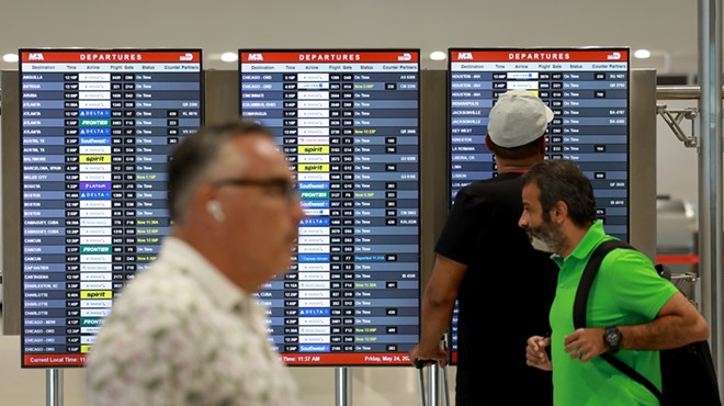 The departure board at Miami International Airport