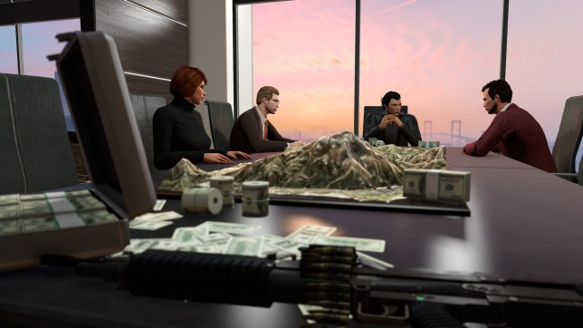 GTA Online image showing characters sat around a table