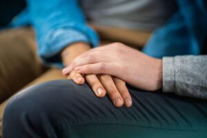 Couple holding hands