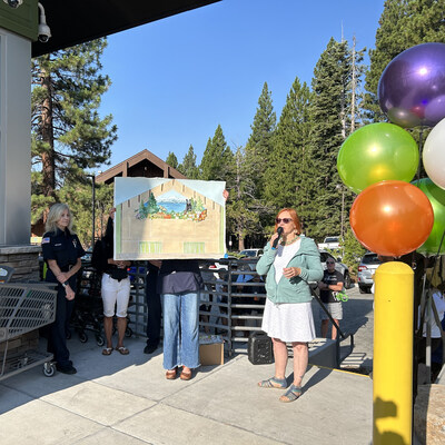 Smith attended Natural Grocers' Grand Opening event on July 31 and spoke with the crowd about her vision for the mural and the partnership.